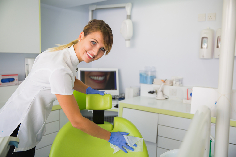 Smiling,Woman,Dentist,Cleaning,Up,Dentist,Chair,After,Procedures.